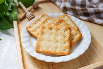 Sugar Crackers, sugar Biscuit in white ceramic plate, coffee break