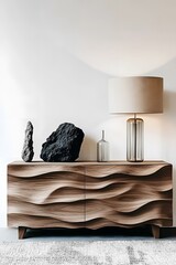 Design wooden carved cut cabinet with decor and lamp near white blank mock up wall with copy space in minimalist interior design of modern living room.

