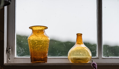 antique carriages displayed in museum setting.