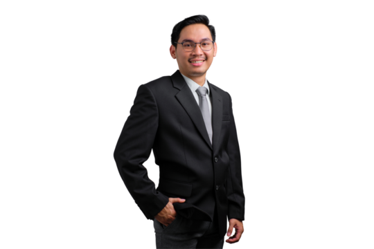 Confident young Asian businessman in black suit smiling and posing with hand in his pocket, isolated on transparent background - Powered by Adobe