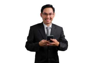 Young Asian businessman in black suit holding smartphone and smiling isolated on transparent background
