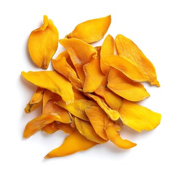 Flat lay of organic dried mango pieces isolated on a white background 