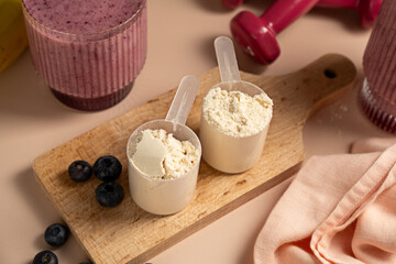 Collagen, creatin or protein powder pouring in a glass. Food supplement, fitness sport, health and nutrition.