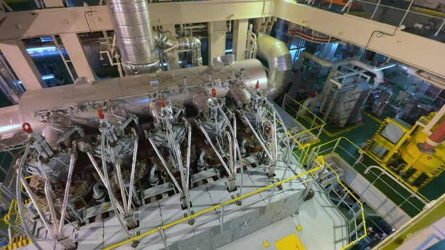 Large marine diesel in engine room of ship