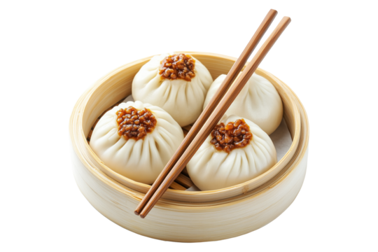 Steamed dumplings in bamboo steamer with wooden chopsticks placed on top, isolated on a white transparent background, concept of Asian cuisine