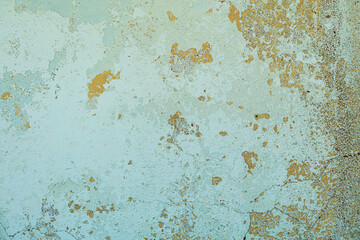 Soft pastel abstract background on old crumbling building wall.