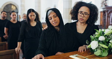 Sad, women and coffin at funeral for farewell service, mourning death and goodbye at burial...