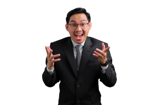 Excited young Asian businessman celebrating success with hands raised isolated on transparent background - Powered by Adobe