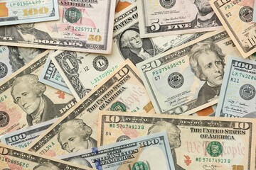 Stack of dollar bills. Hundred, fifty, twenty, ten, five dollars banknote close up