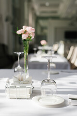 Glassware And Flowers On Table