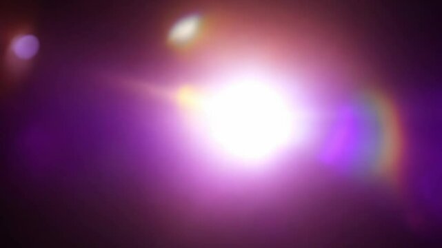 Radiant light burst transforming from pinpoint to blinding glow in expansive darkness.