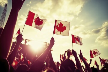 Joyful crowd waving canadian flags at sunset celebration event
