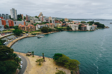 Obraz premium Wideshot of kirribilli with the olympic park and Milsons Point in Sydney Harbour, NSW, Australia