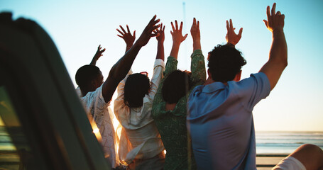 People, hands and friends at beach for freedom with road trip, excited and support outdoor. Sunset, students and happy to celebrate, travel or vacation from back with connection on nature adventure
