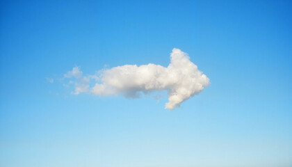 Arrow-shaped cloud drifting in clear blue sky, nature's symbolism