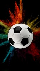 Fototapeta premium Soccer ball with coloured powder explosion.