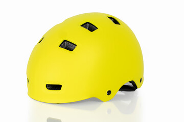 Fototapeta premium Yellow helmet on a white table and isolated