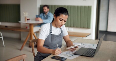 Coffee shop, finance and woman on laptop in cafe for menu items, inventory and order checklist....