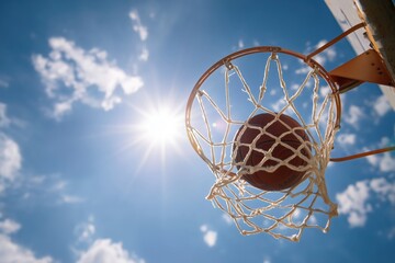 Basketball Swishing Through Net During Sunny Day