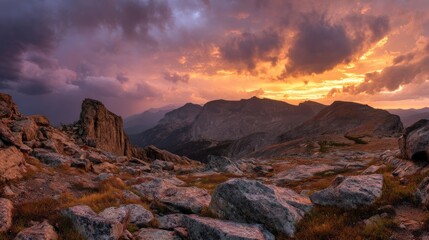 Breathtaking Sunset Over Majestic Mountains and Rocky Landscape