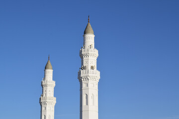 Fototapeta premium Close up of Quba Mosque Tower. Quba Mosque is the first mosque built in the history of Islam located in Medina al-Munawwarah, Saudi Arabia
