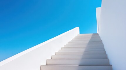 White stairs ascending against a clear blue sky; success, growth concept