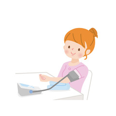 血圧を測る若い女性