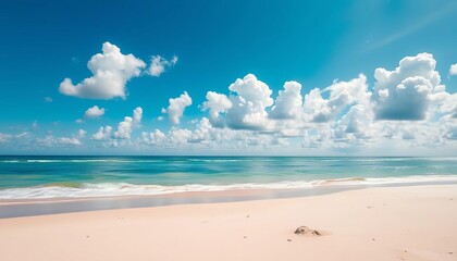 Fototapeta premium Azure summer sky, fluffy white clouds above a tranquil sandy beach, calm, horizon