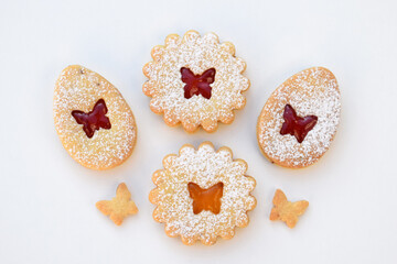Linzer cookies filled with strawberry and apricot jam. Easter baking
