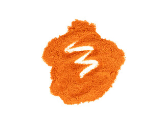 Scattered dry spice paprika on a white background