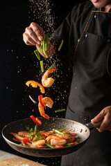 Chef Preparing Shrimp Stir Fry with Seasoning
