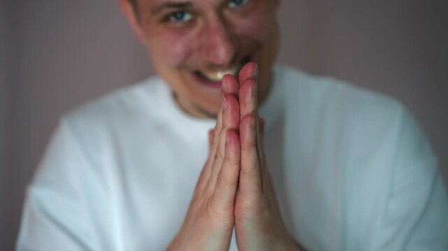 The guy came up with a cunning plan and rubs his hands with a sly smile.
A mercenary man.
Tapping his fingers in anticipation.
A third person with bad intentions