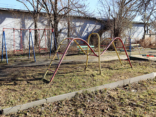 playground in the old yard of an old house