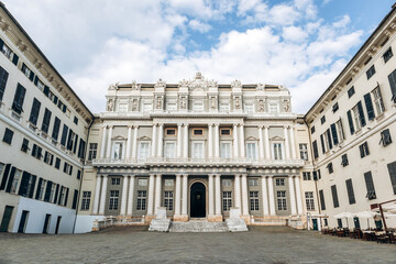 Fototapeta premium Majestic neoclassical facade of Palazzo Ducale with columns and statues dominates the historic city center.