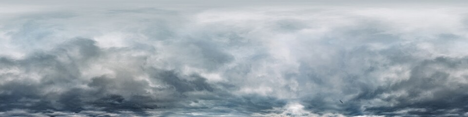 Obraz premium Dark moody rain clouds in dramatic overcast sky. Seamless 360 HDR spherical panorama. Full zenith or sky dome in 3D environment, sky replacement for aerial drone panoramas. Climate and weather change.