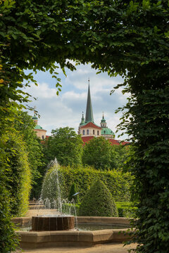 Living green arch of bushes makes natural frame for the fountain in Wallenstein Garden (Vald&scaron;tejnsk&aacute; zahrada) Prague,Czech Republic 