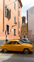 Italian architecture and yellow car in the center of Verone city and italian architecture in Italy on 3th may 2025