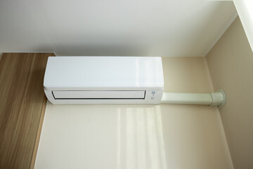Air conditioner wall mount indoor unit. Part of air conditioning HVAC split system for climate, temperature and humidity control. To cool or cold in room of home building.