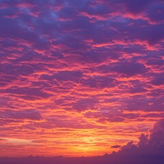 Fototapeta premium Vibrant Pink And Orange Sunset Sky With Clouds