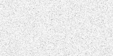 Terrazzo background with scattered gray and black dots. Rock spatter stone marble backdrop. White wall texture with noise overlay pattern. Vintage quartz terrazzo flooring.