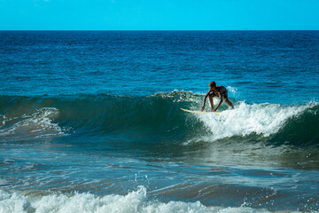 surfer in landscape horizon sky and sea