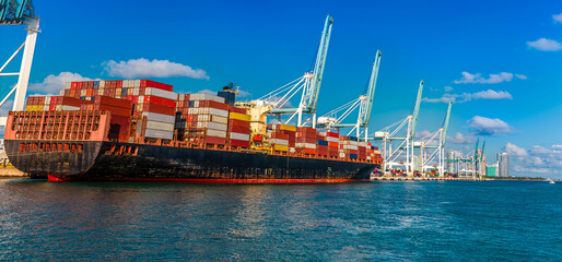 A close up view of a container ship at the South Florida Container Terminal in Miami in springtime