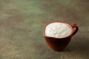 Plain curd or yogurt or Dahi. Traditional Indian fermented milk sauce. Copy space