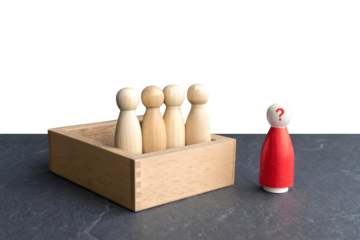 A minimalistic scene with five wooden figurines. Four natural wood-colored figurines stand in a row inside a dashed rectangular box