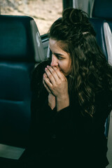 The girl is riding the train