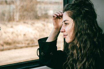 girl in the train by the window