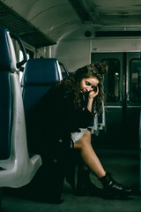 The girl is riding the train