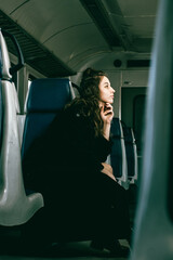 The girl is riding the train