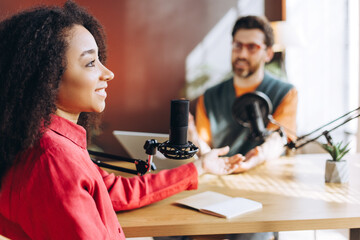 Content creators recording a podcast in a studio