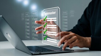 Person Completing Tasks on Laptop with Digital Taskmaster Interface